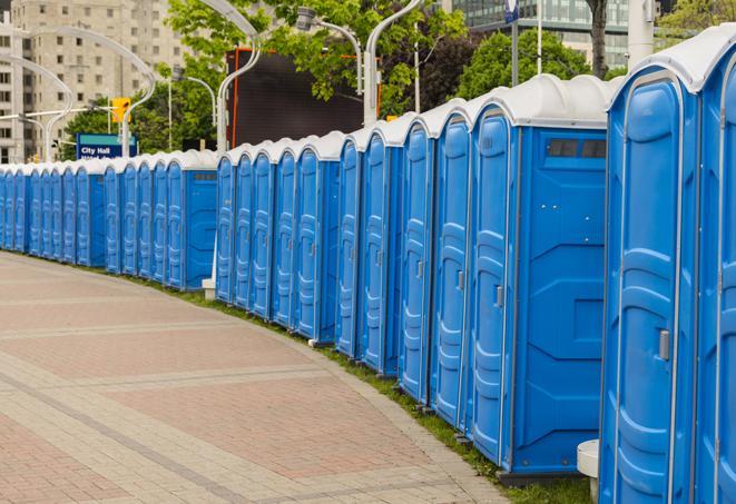a row of portable restrooms at a fairground, offering visitors a clean and hassle-free experience in hellertown
